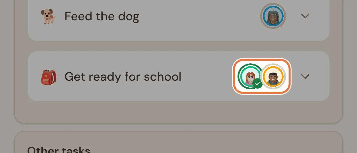 A task card in By task view with two kid avatars, one with a green ring and tick and one with a grey ring